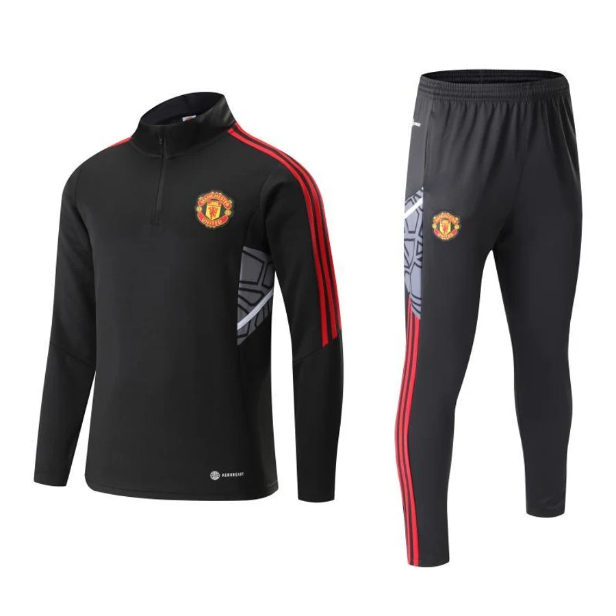 Manchester United half-zip training set on a white background