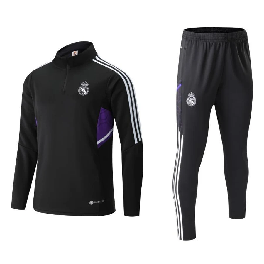 Real Madrid half-zip training set on a white background